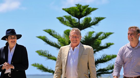 Fortescue boss Andrew Forrest (centre) with Queensland Premier Annastacia Palaszczuk and Deputy Premier Steven Miles in Gladstone on Sunday.