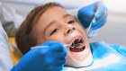 A boy at dentist.