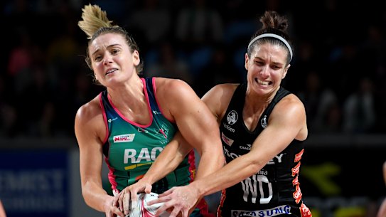 The Magpies' Ashleigh Brazill (right) clashes with the Vixens' Liz Watson.