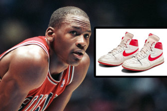 Michael Jordan and the trainers he wore in his fifth NBA game.