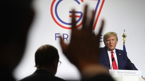 US President Donald Trump takes additional questions following and a joint press conference with French President Emmanuel Macron at the G7 summit in Biarritz, France.