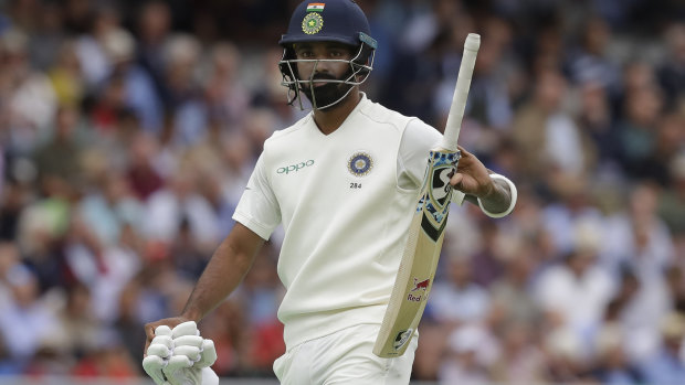 Rolled: India's Lokesh Rahul leaves the pitch after being caught.