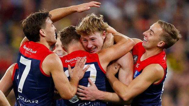 Jacob van Rooyen of the Demons celebrates a goal.