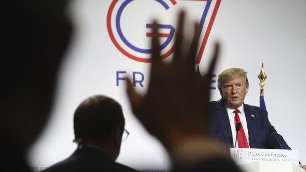 US President Donald Trump takes additional questions following and a joint press conference with French President Emmanuel Macron at the G7 summit in Biarritz, France.