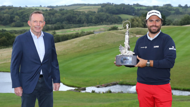 Former Australian prime minister Tony Abbott pictured a few days ago with French golfer Romain Langasque at the Wales Open.