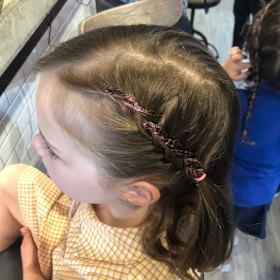 Some of the author's handiwork after his 'Dads and Daughters' hair styling session. Nice.