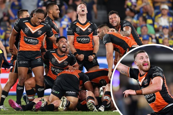 The Tigers celebrate after Jackson Hastings’ last-gasp field goal winner against Parramatta on Easter Monday last year.