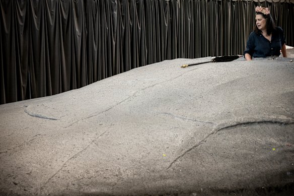 Pamela Rabe rehearsing in her mound in the STC’s production of Happy Days.