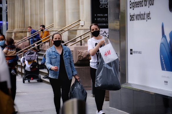 Shoppers return to the streets in Melbourne last week after restrictions lifted. 