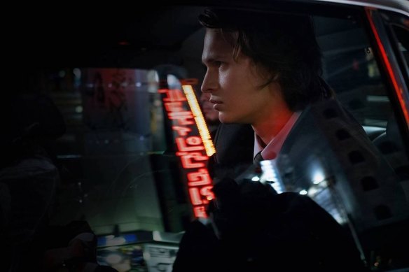 Ansel Elgort is terrific as an American expat and reporter on Tokyo’s venerable city newspaper, Meicho Shimbun.