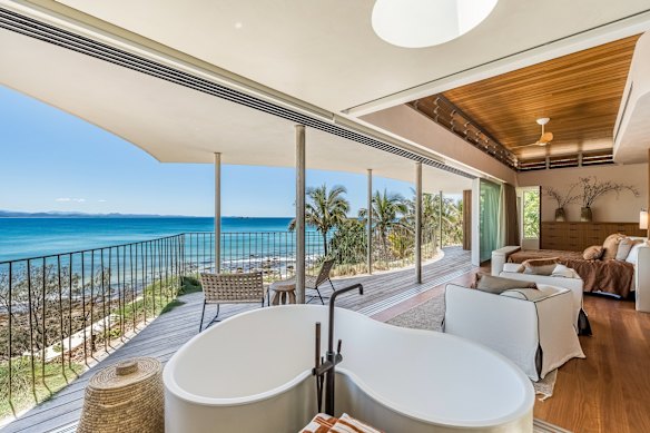 The main bedroom of the five-bedroom abode has an open shower and steam room.