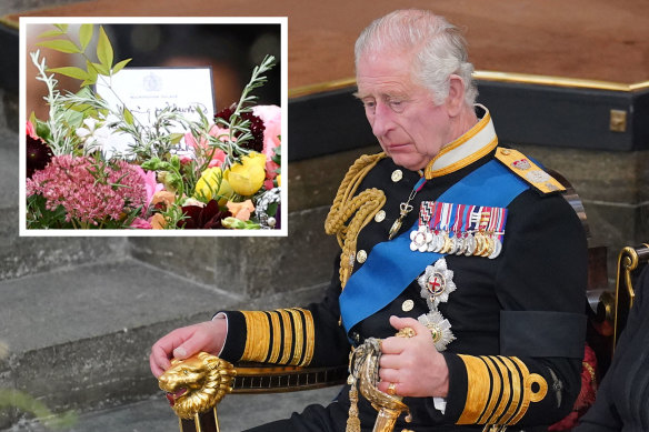 A handwritten card by King Charles on Queen Elizabeth’s coffin says: “In loving and devoted memory. Charles R.”