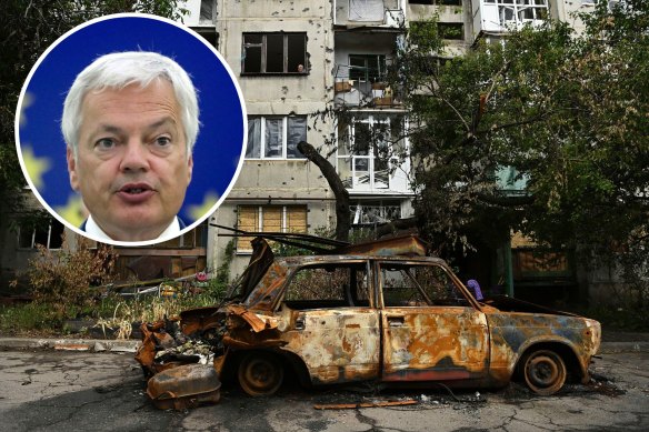 EU Justice Commissioner Didier Reynders (inset). More than 23,000 alleged war crimes have been registered in Ukraine so far.
