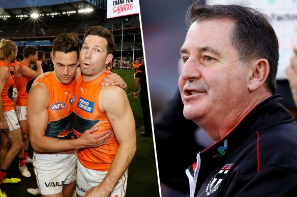 Contrasts: The triumphant Giants and St Kilda coach Ross Lyon.