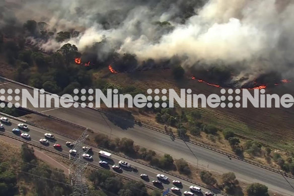 Traffic is banking up as emergency services work to clear the scene and contain the blaze.