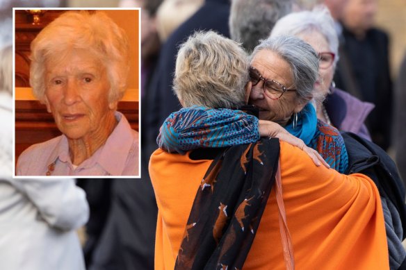 Mourners embracing outside St Patrick’s Catholic Church in Cooma, where Clare Nowland was farewelled.