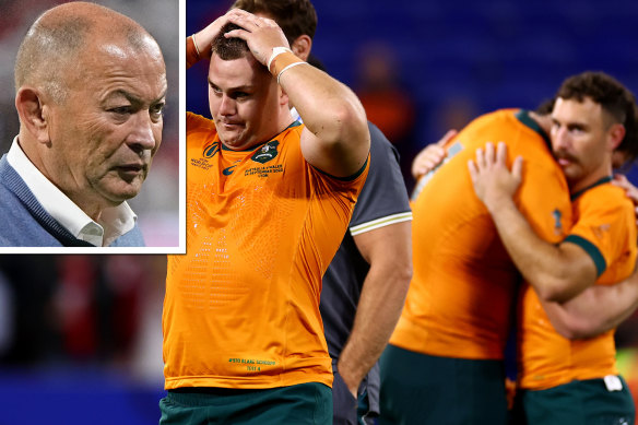 Wallabies captain Eddie Jones and players after losing to Wales