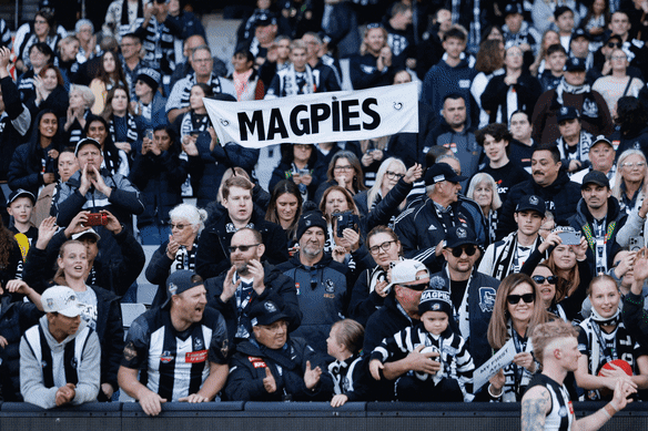 Footy fans cheer on their teams in 2024.