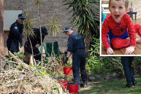 NSW Police search the gardens below a balcony at the home from which William Tyrrell disappeared.