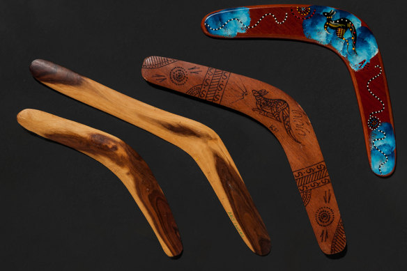The two boomerangs on the right are of the fake type commonly sold in souvenir stores around Australia. The other two are genuine boomerangs by Rolley Mintuma at Maruku Arts, NT.