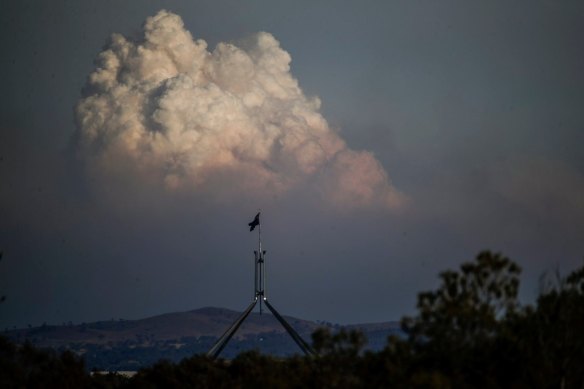 A pyrocumolonimbus cloud caused by a bushfire near Braidwood created a dramatic backdrop to Parliament House in Canberra in 2019.