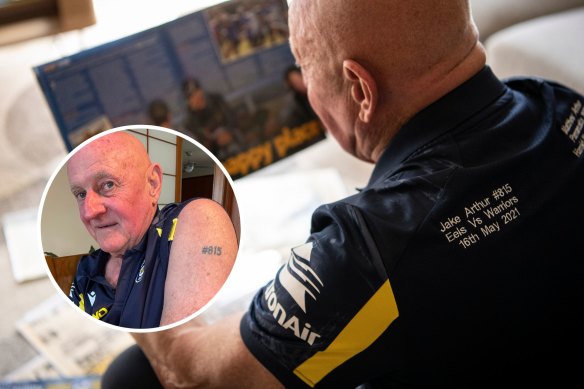 Ted Arthur with his custom-made Eels polo and a tattoo he inked to celebrate Jake Arthur’s debut as Parramatta player #815.