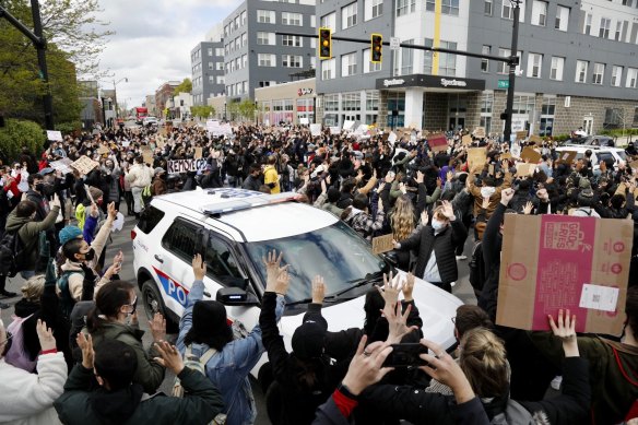 Ohio State students gather on High Street to protest the police shooting that killed Ma’Khia Bryant and call on the university to cut its ties with the Columbus Police Department, after police shot and killed the 16-year-old on Wednesday.