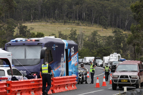 Long lines of traffic at the border checkpoint in Genoa in eastern Victoria on Friday.