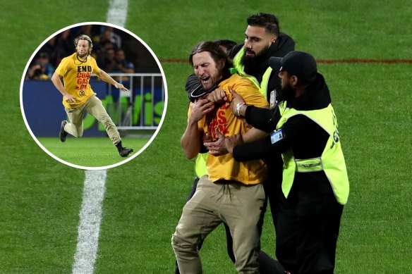 Former Canberra Raiders star Mark McLinden disrupted the NRL grand final as an environmental protest.