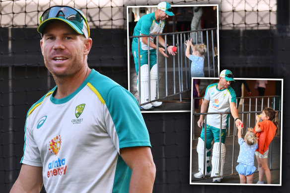 David Warner plays with his daughters before a net session at Adelaide Oval on Tuesday night. 