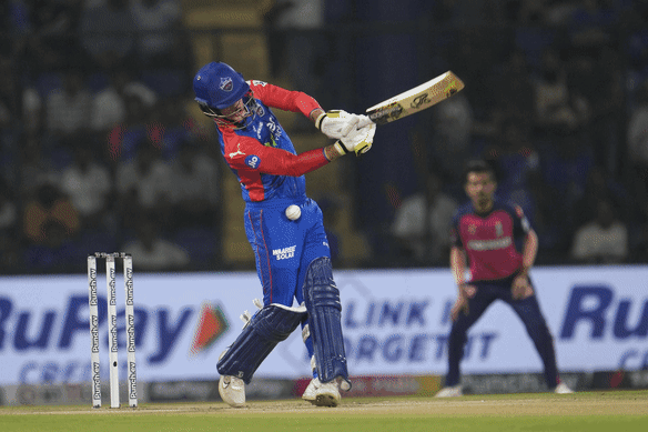 Jake Fraser-McGurk, batting for the Delhi Capitals, is hit in the midriff from the bowling of Kiwi speedster Trent Boult (Rajasthan Royals).