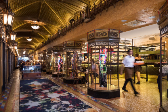 Parlour at QT Sydney has kept the original glass vitrines of Gowings department store and continues to  house fashion.