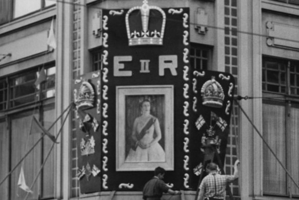 A portrait of the newly-crowned Queen is erected at Prouds on Pitt Street, Sydney on June 5, 1953