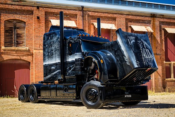 Damian Toms’ prime mover with the bonnet raised to show the Grim Reaper design. Toms estimates $850,000 has been spent to purchase and customise the vehicle.