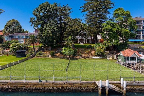 Luxurious touches include a tidal harbor pool, lawn tennis court and private marina dock. 