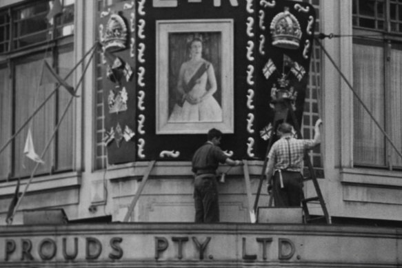 A portrait of the newly-crowned Queen is erected at Prouds on Pitt Street, Sydney on June 5, 1953