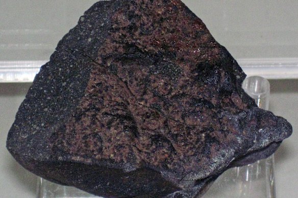Carbonaceous chondrite meteors are often scorched black, and may look unusual compared to surrounding rocks.
