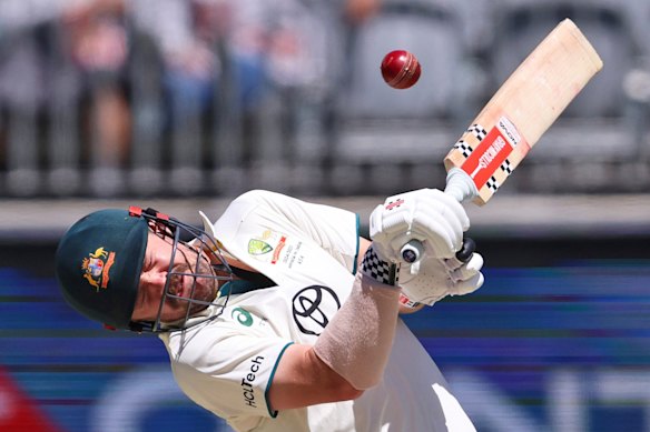 Travis Head avoids a bouncer.