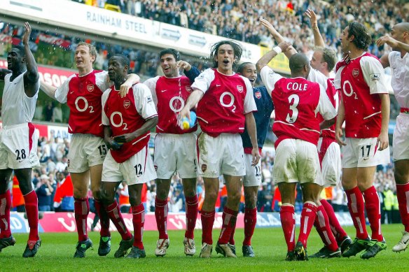 Arsenal celebrate winning the league at Tottenham’s former home ground two decades ago.