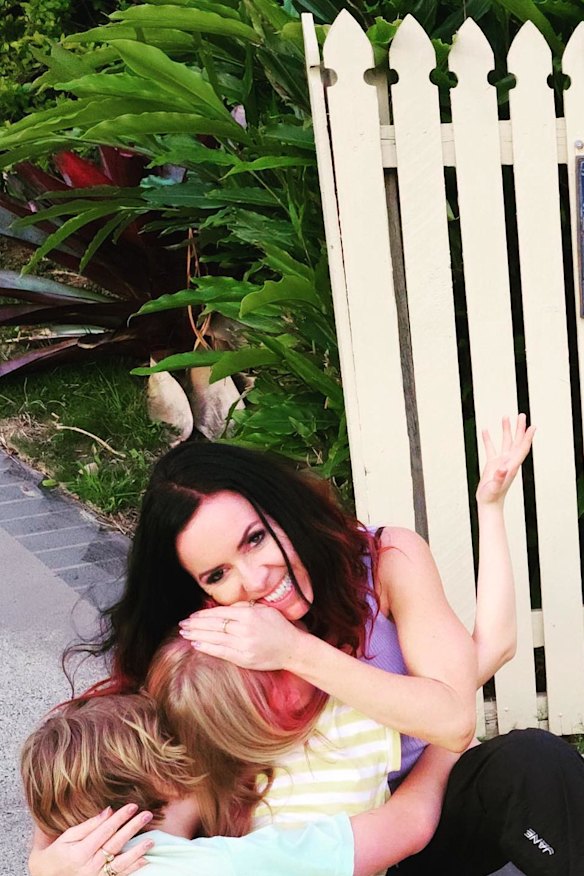 Nicole Pedersen-McKinnon and her two children.