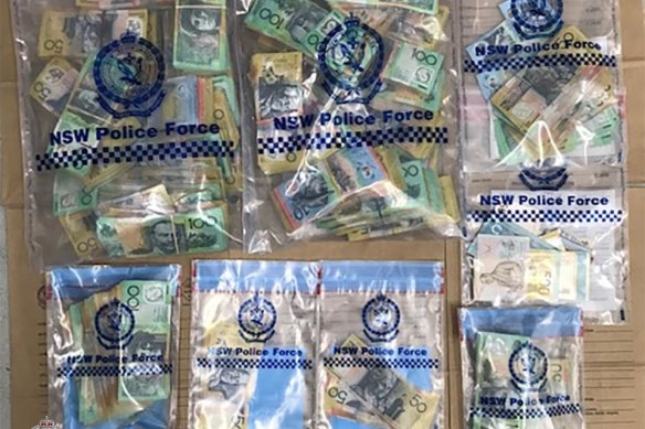 Money found in a house in Kingsford in a raid connected with the investigation.