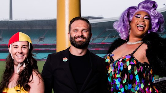 Lifesaver Michele Ricketts, Mardi Gras chief executive Albert Kruger and performer Coco Jumbo at the Sydney Cricket Ground, which will again host the Mardi Gras parade. 