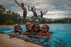 Disease rates halved, kids in school: The towns where a local pool changed lives