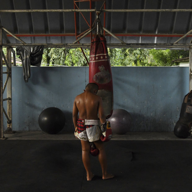 Samsun at the bags in the Nor Naksin Muay Thai camp.