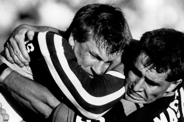 Shane Flanagan tackles Alan McIndoe during his playing days with Western Suburbs.