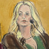Stormy Daniels testifies as a promotional image for one of her shows is displayed on a monitor.
