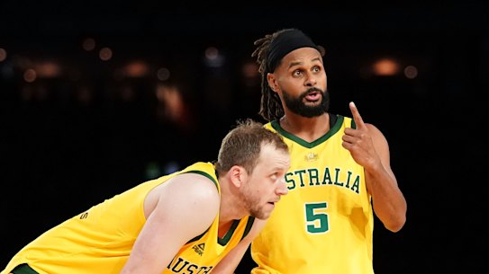 Joe Ingles (left) and Patty Mills were two of the stars for Australia.