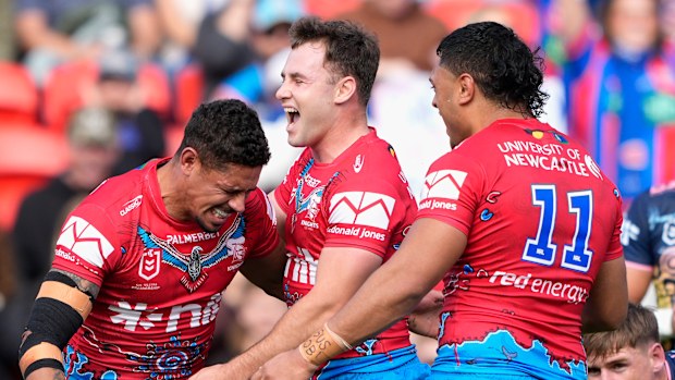 Dane Gagai celebrates after scoring his second try against the TItans.