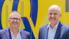 IAG CEO Nick Hawkins, left, with RACQ CEO David Carter on Thursday.