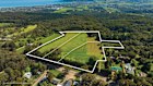 The 17-acre (6.9 hectare) parcel of land across three titles at 380-396 Arthurs Seat Road in Red Hill on Victoria’s Mornington Peninsula sold by private treaty for $7.4 million.